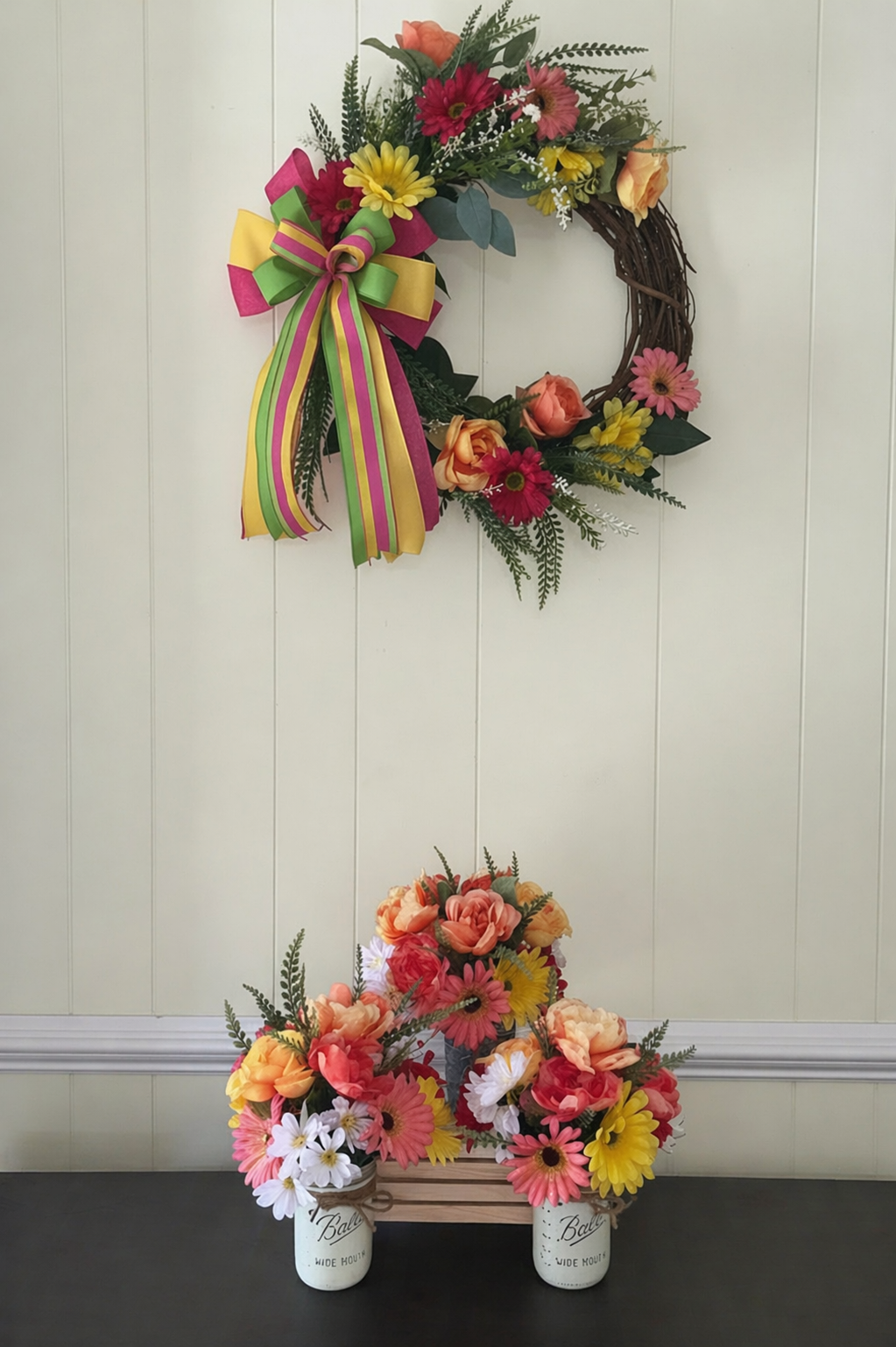 Bright Spring Garden Collection 20" grapevine wreath with matching mason jar floral set on entryway table.