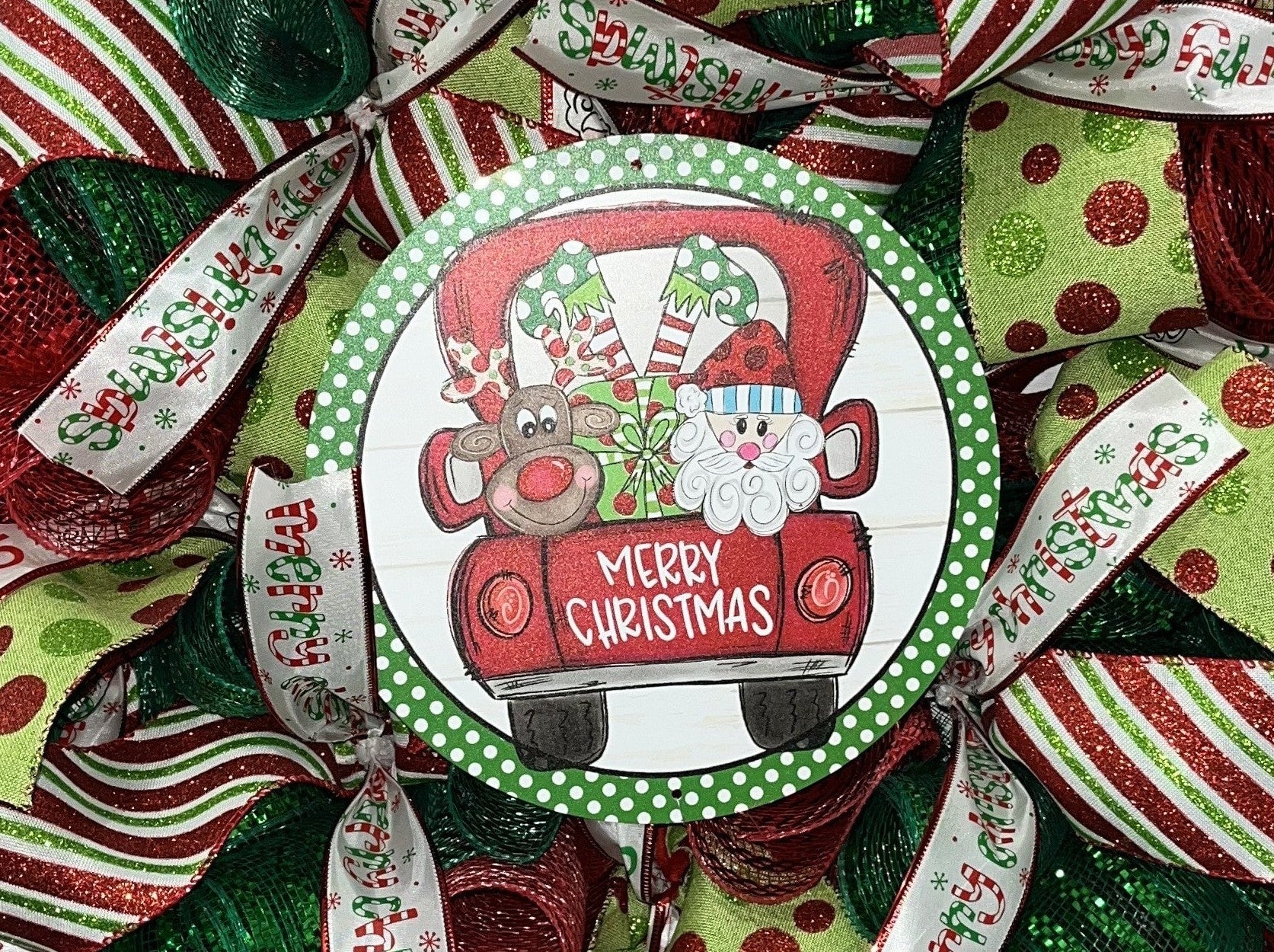 Whimsical Santa & Reindeer Truck Christmas Wreath – Festive Red & Green Door Decor